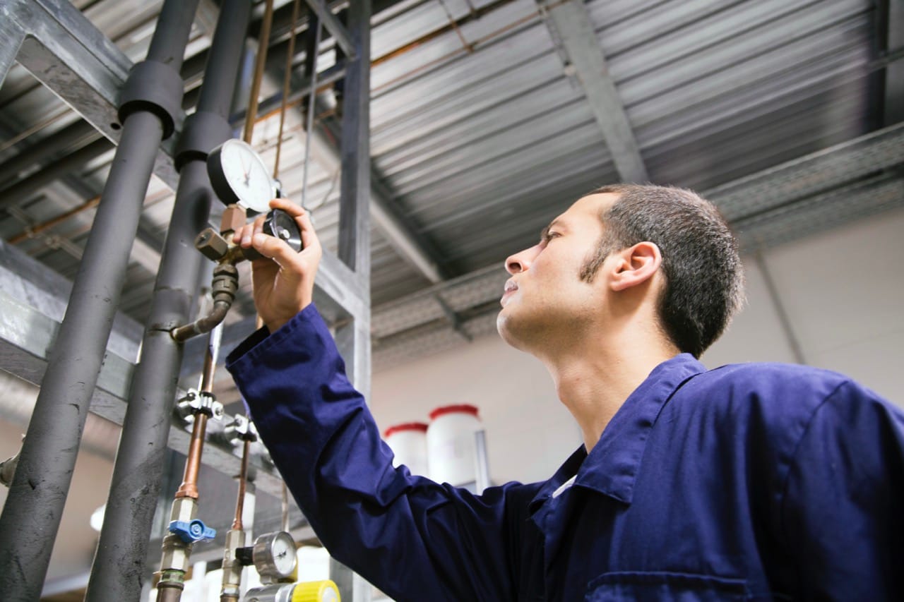 technician-working-in-a-technical-room-looking-at-2026-01-05-01-03-12-utc Large